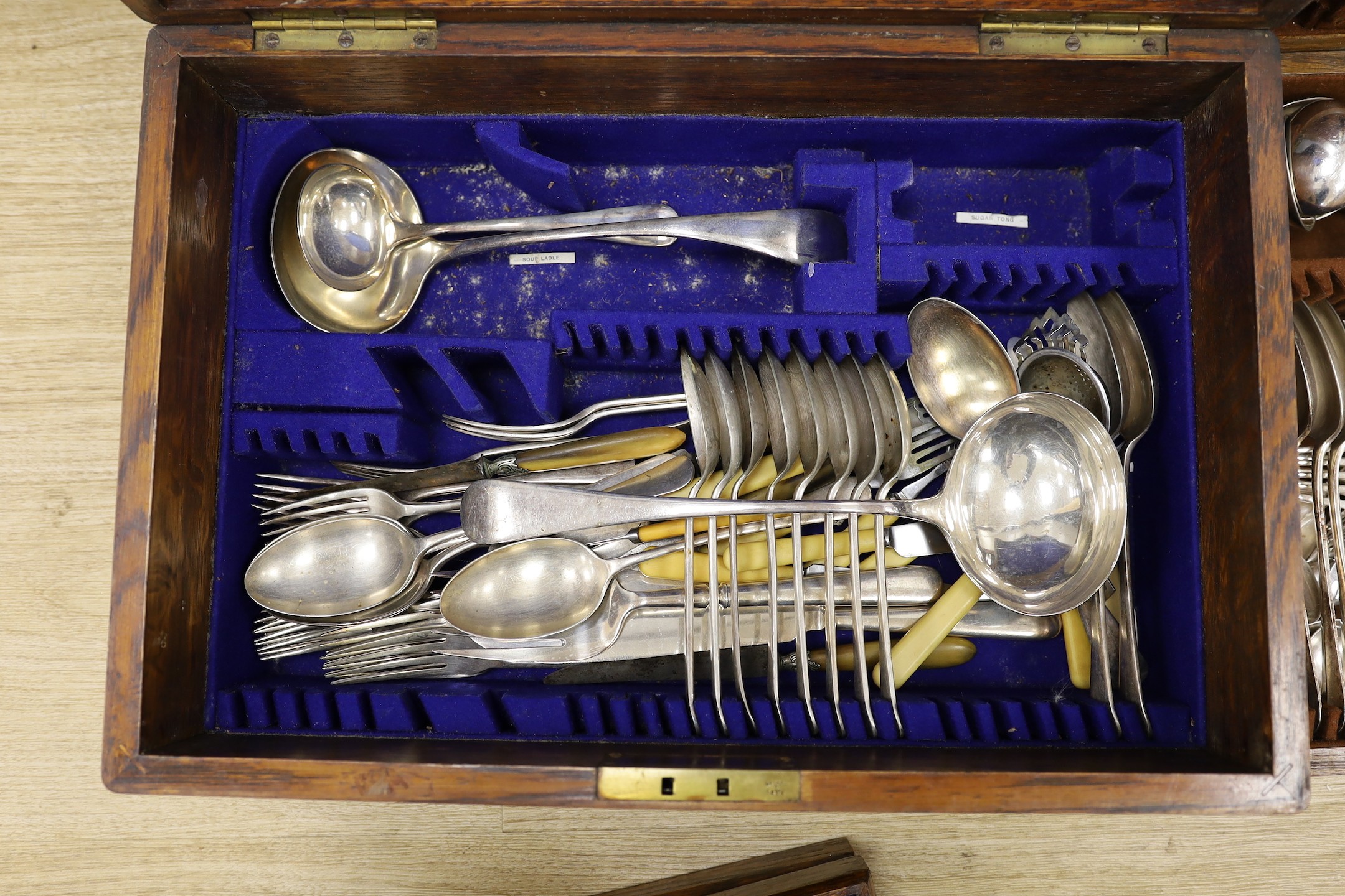 Two Mappin and Webb oak cased part cased plated canteens of cutlery